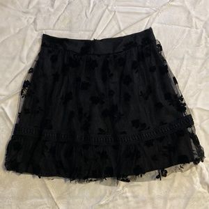 black mid length skirt